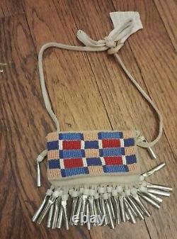 Crow strike-a -light medicine bag wampum seed beads, leather, tin cones