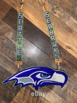 Hand made glass beaded seahawk medillions with leather straps