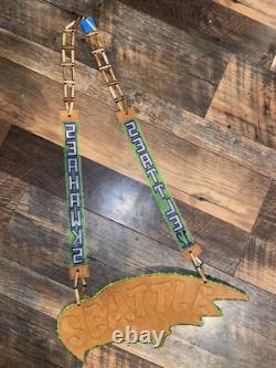 Hand made glass beaded seahawk medillions with leather straps