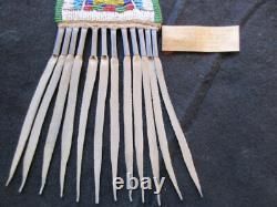 NATIVE AMERICAN BEADED LEATHER MEDICINE BAG with CONE FRINGES, PORT-092307922