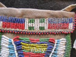 NATIVE AMERICAN BEADED LEATHER MEDICINE BAG with CONE FRINGES, PORT-092307922
