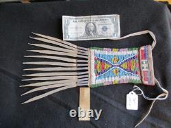 NATIVE AMERICAN BEADED LEATHER MEDICINE BAG with CONE FRINGES, PORT-092307922
