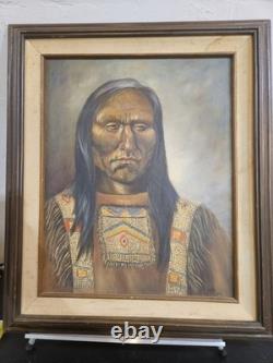 Native American Elder Painted In A Beaded Garment