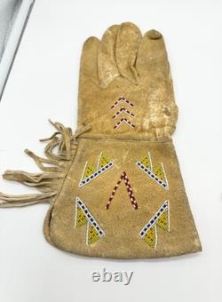 Pair of Northern Plains Indian Beaded Gauntlet gloves Early 20th century