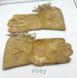 Pair of Northern Plains Indian Beaded Gauntlet gloves Early 20th century