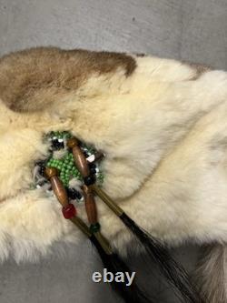 Vintage Native American beaded leather mountain fur hide