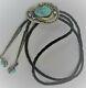 Vintage Turquoise Detailed Navajo Sterling Silver Bolo Tie On Black Leather